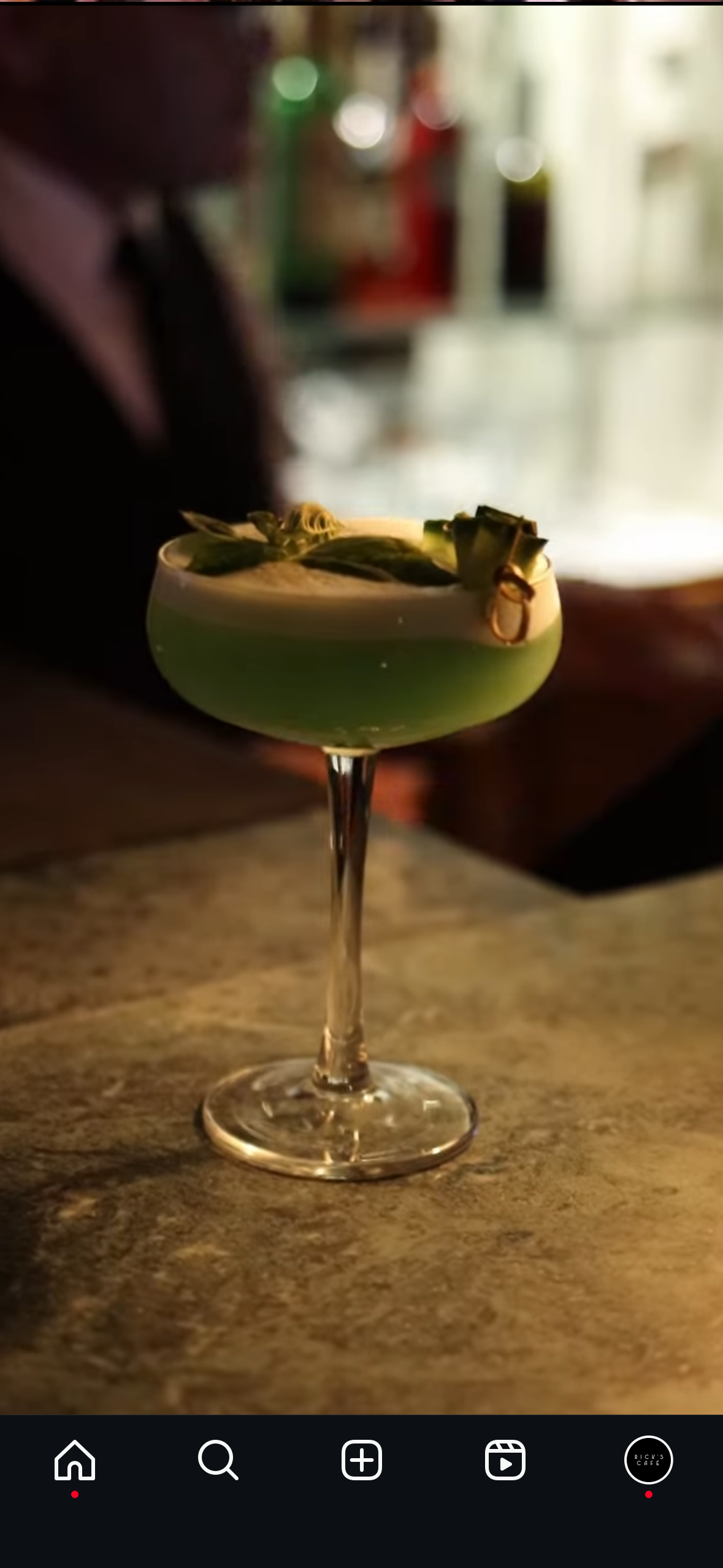 A green signature cocktail served at Rick’s Café Casablanca